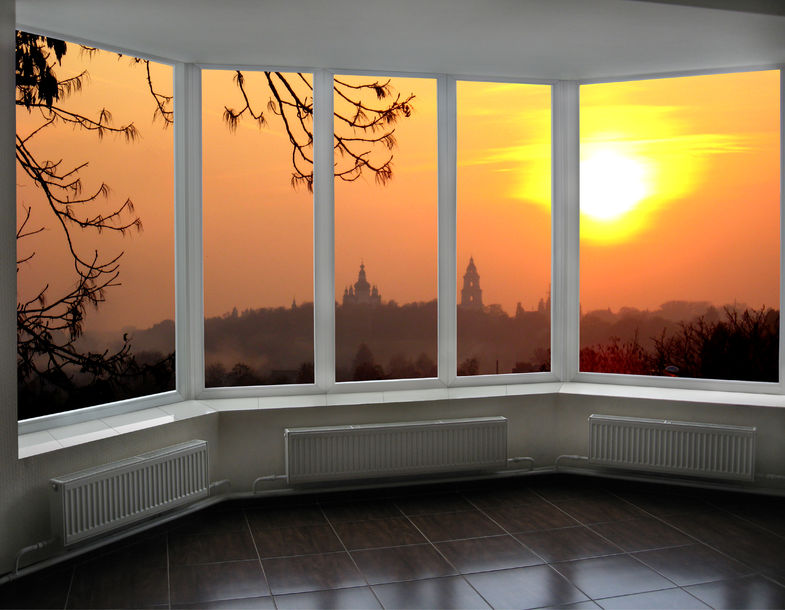 54376023 - plastic windows overlooking the beautiful fiery red sunset